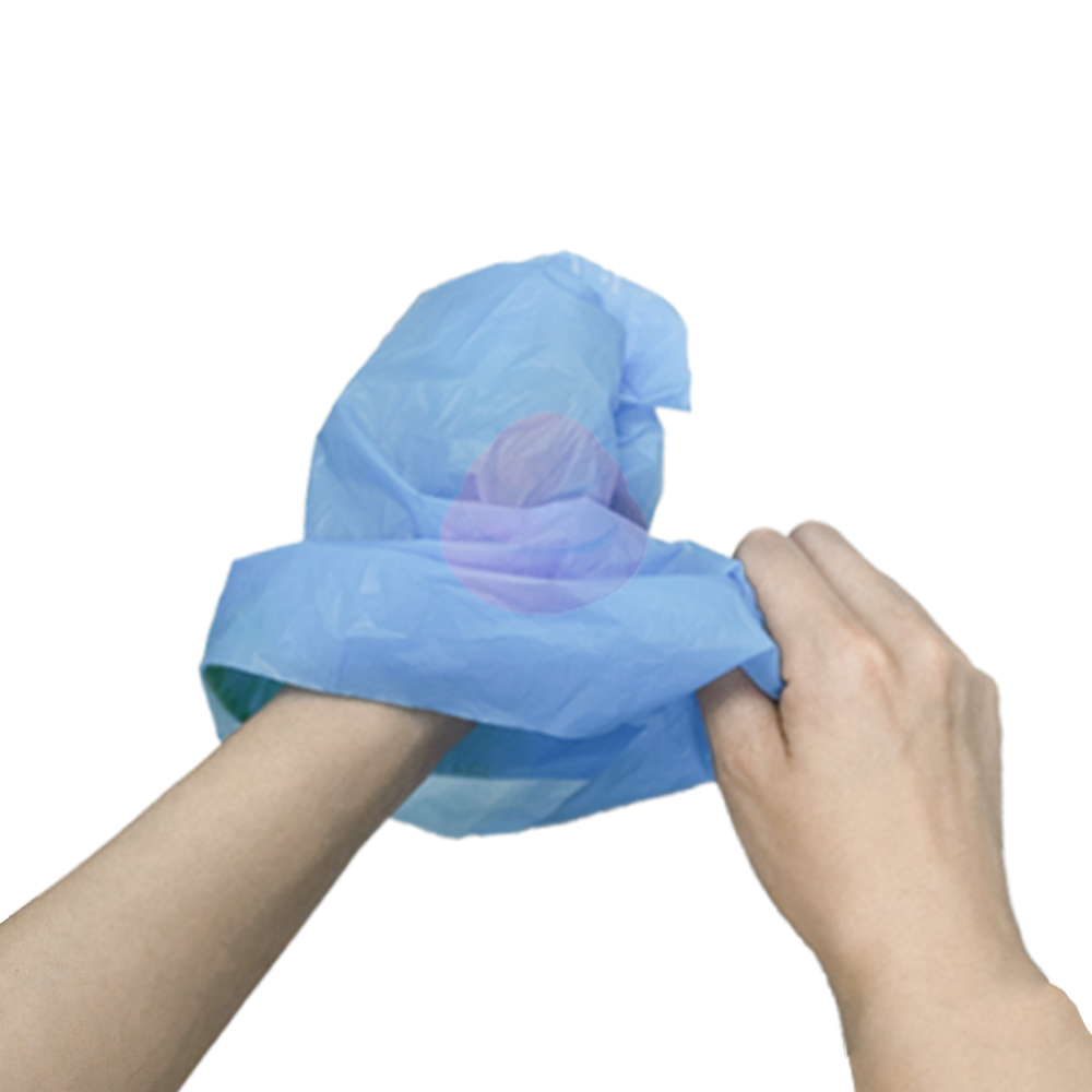 When finished, flip the bag over to wrap the waste.